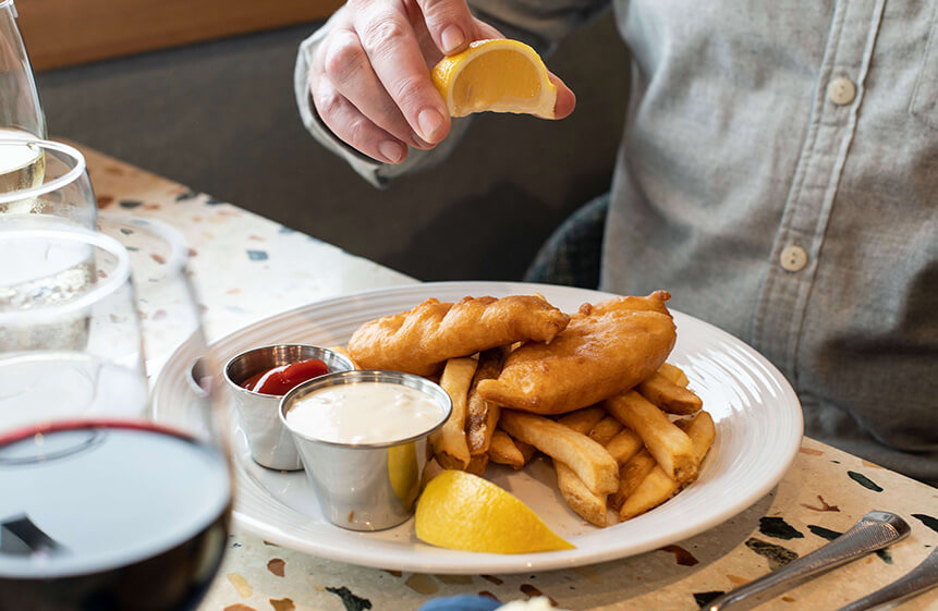 Tender Pacific halibut fillets dipped in local Depoe Bay Brewing ale batter and deep-fried to a golden brown. Presented with fries and tartar sauce.