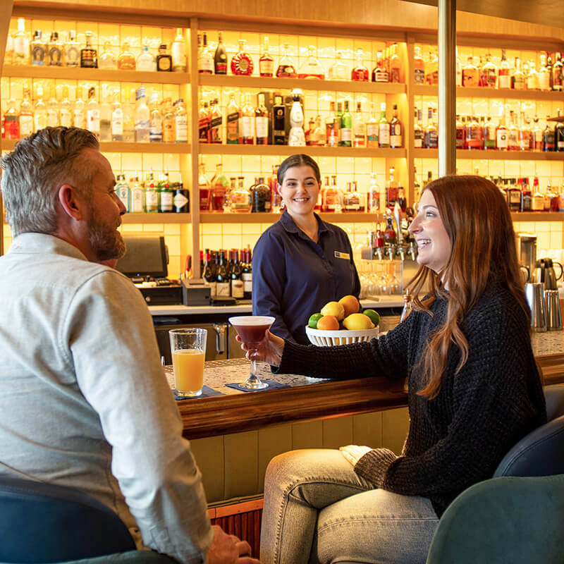 a couple enjoying the bar at Georgie's