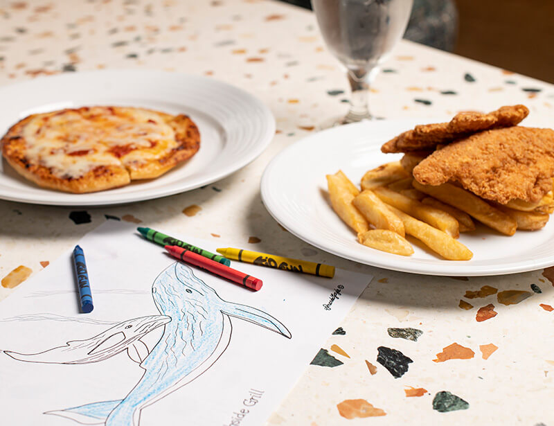 Kid's pizza and chicken fingers with fries at Georgie's
